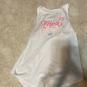 This is a loose, white under armor tank top.